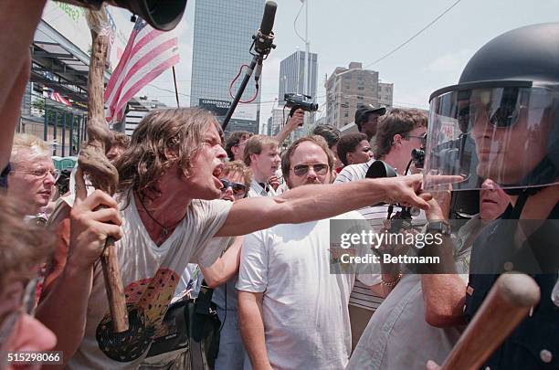 Demonstrators and riot police during a demonstration against the KKK and Neo-Nazi groups near the site of the 1988 Democratic National Convention