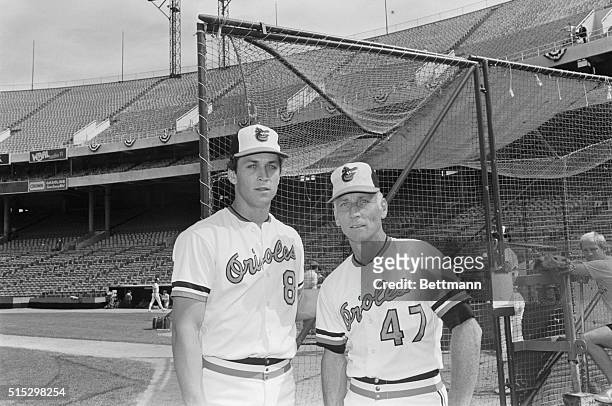 Baltimore, Maryland- Orioles' star shortstop Cal Ripken, Jr., and his father, the third base coach, are pictured at Memorial Stadium 10/4 during...