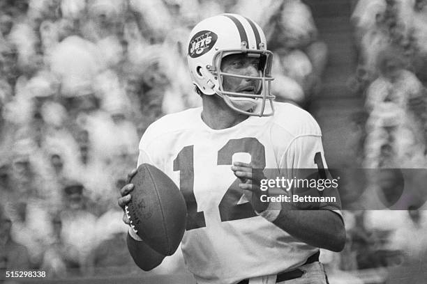 New Haven, CT: Excellent passing action on Joe Namath, NY Jets Quarter back during Jets-Giant game at New Haven.