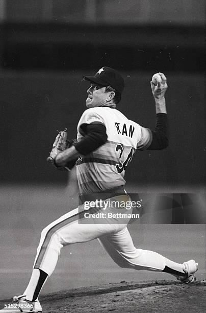 Houston, TX- Pitching his 250th victory, Houston Astros' Nolan Ryan fires home in first inning to help the Astros beat the Chicago Cubs 7-1, 7/27....