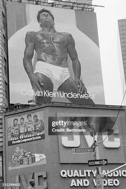 New York, NY- Star of another of designer Calvin Klein's business ventures, men's underwear, is Tom Hintinhous, appearing on this 40x50 foot...