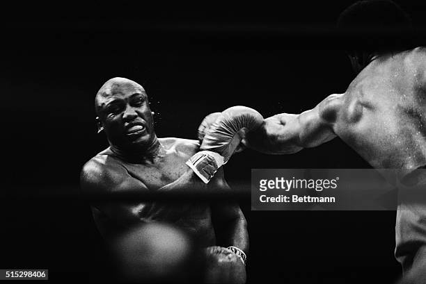 Uniondale, NY- It's all over for Joe Frazier. A George Foreman left hook to the head in the fifth and final round sends Frazier reeling, June 15th at...
