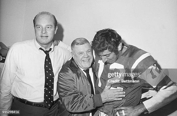 New York, New York- Delighted Jet coach Weeb Ewbank hugs his quarterback Joe Namath after Joe led the Jets to a 27-23 victory over the Oakland...