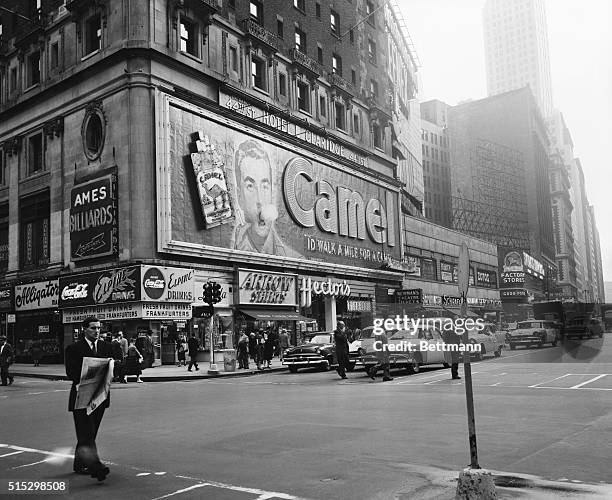 Billboard for Camel Cigarettes blows smoke over Times Square in Manhattan.