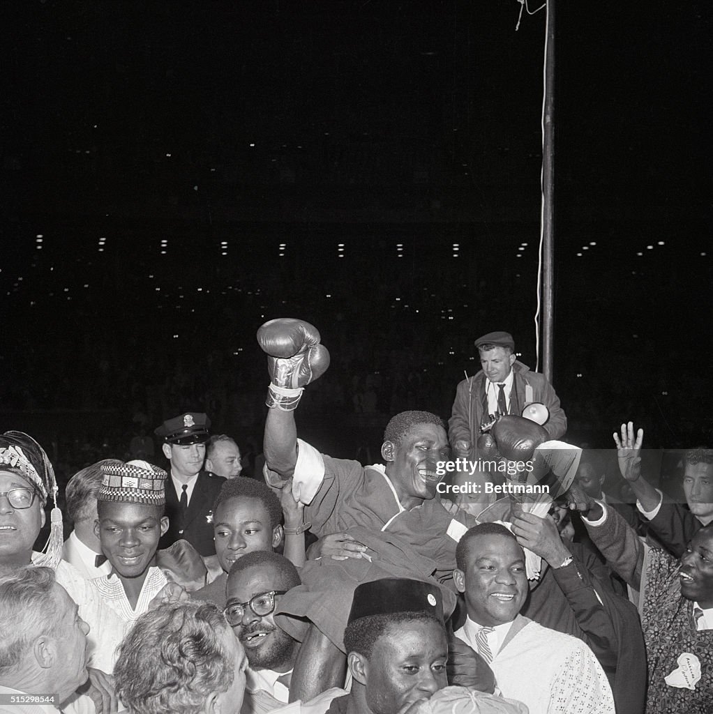 Closeup Dick Tiger Lifted On Shoulders