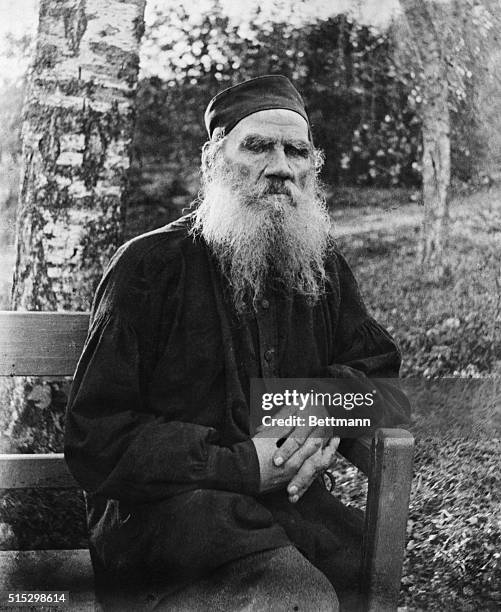 Leo Tolstoy- Russian novelist and moral philosopher. Tolstoy is shown seated, as an older man with a flowing beard. Undated photograph.