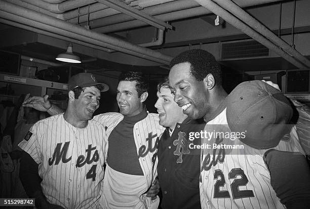 New York, New York-Happy Mets are: Ron Swoboda, J.C. Martin, Tom Seaver and Donn Clendenon in dressing room after 2-1 victory in 4th game of World...