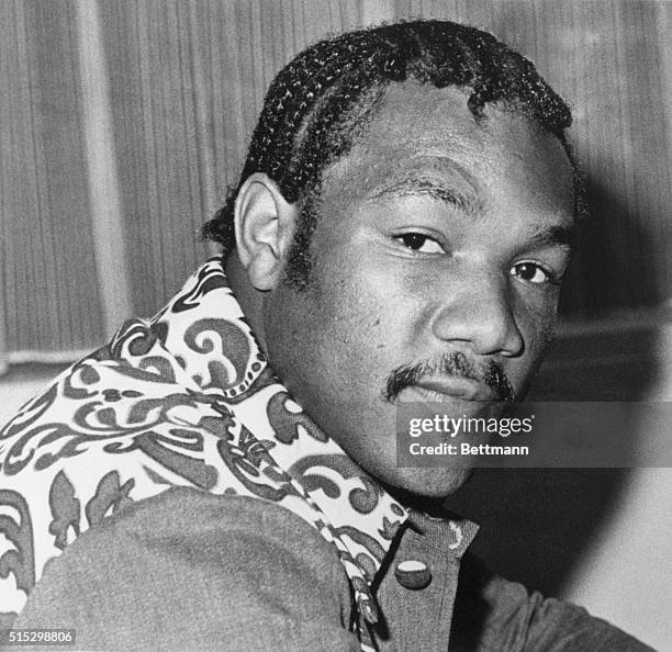 Houston, TX-World champion George Foreman shows off his new Afro look. Foreman said he plans to wear his hair braided during his fight with Muhammad...