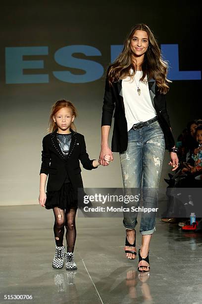 Models, wearing Diesel Kid, walk the runway at petitePARADE / Kids Fashion Week, NYC on March 12, 2016 in New York City.