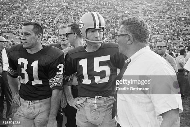 Los Angeles, California-Green Bay's Vince Lombardi shown with Jim Taylor,, and Bart Starr,, on the sidelines during the Super Bowl game against the...