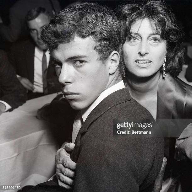 Rome, Italy-Italian actress Anna Magnani and her son Luca are pictured at a ceremony here, where she was awarded a "Silver Mask." Young Luca is a...