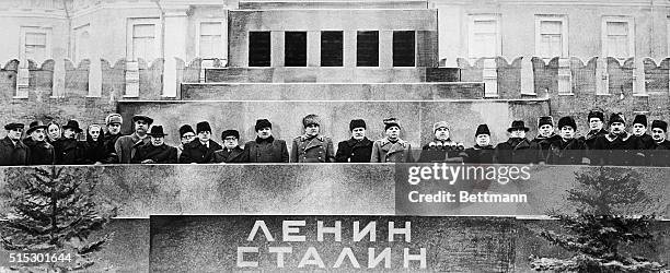 Communist leaders from all over the world stand at the Lenin Mausoleum for the funeral of Joseph Stalin. The group includes Soviet military leader...