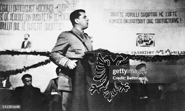 Albania- Col. General Enver Hoxha, 36-year-old commander of the Albanian Army and Prime Minister of the People's Government, addresses a People's...