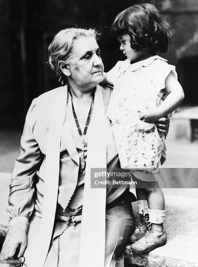 Jane Addams Holding Little Girl at Hull House