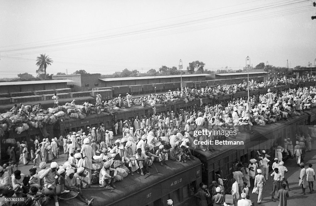 Indian Refugees Piling on Trains