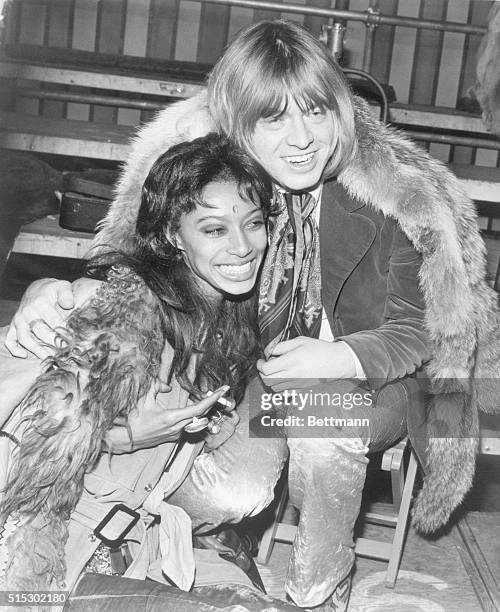 London, England-Fur-coated Rolling Stone Brian Jones and American model Donyale Luna watching rehearsals at the Intertel Studios. A TV spectacular...