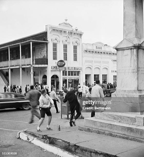 Oxford, Mississippi: Three burned-out cars are evidence 10/1/ of the violence that rocked this college town during the previous night. Two persons...