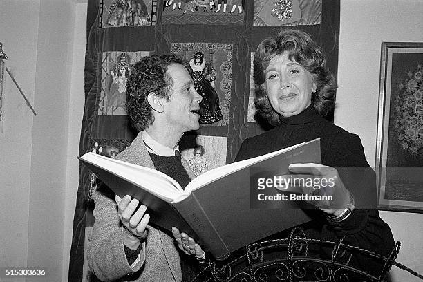 New York, NY- Beverly Sills, general director of the New York City Opera, glances 2/28 over script of Silverlake with Joel Grey. Grey will star in...