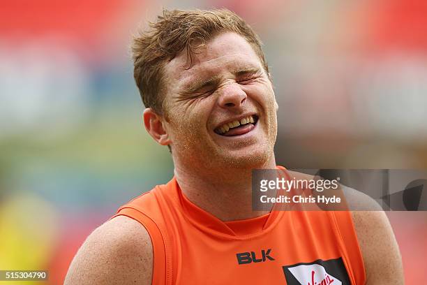 Heath Shaw of the Giants smiles after winning the NAB Challenge AFL match between the Brisbane Lions and the Greater Western Sydney Giants at...