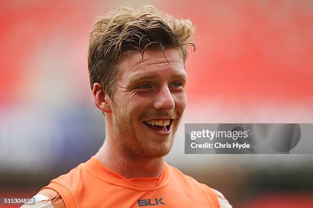 Aidan Corr of the Giants smiles after winning the NAB Challenge AFL match between the Brisbane Lions and the Greater Western Sydney Giants at...
