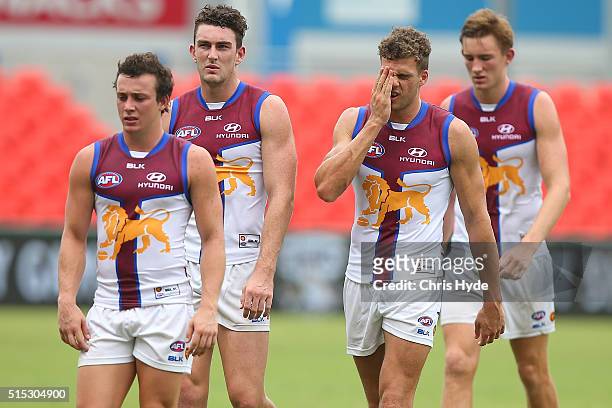 Lions leave the field after losing the NAB Challenge AFL match between the Brisbane Lions and the Greater Western Sydney Giants at Metricon Stadium...