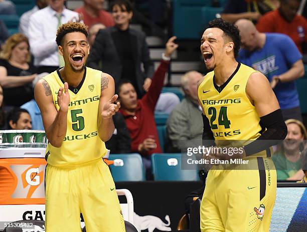 Tyler Dorsey and Dillon Brooks of the Oregon Ducks celebrate their 88-57 victory over the Utah Utes to win the championship game of the Pac-12...