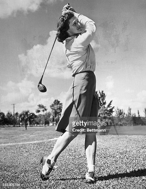 Mrs. Babe Didrikson Zaharias drives a long one in the Helen Lee Doherty Golf Tournament. Mrs. Zaharias is a heavy favorite against Mary Agnes Wall,...