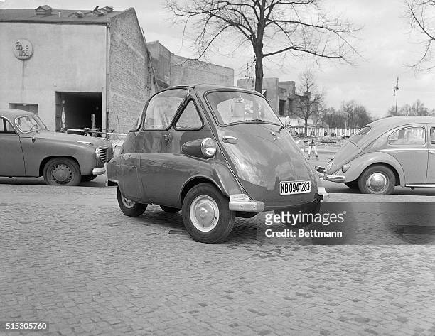 Angled front view of a BMW Isetta minicar. Photograph, circa 1950's.