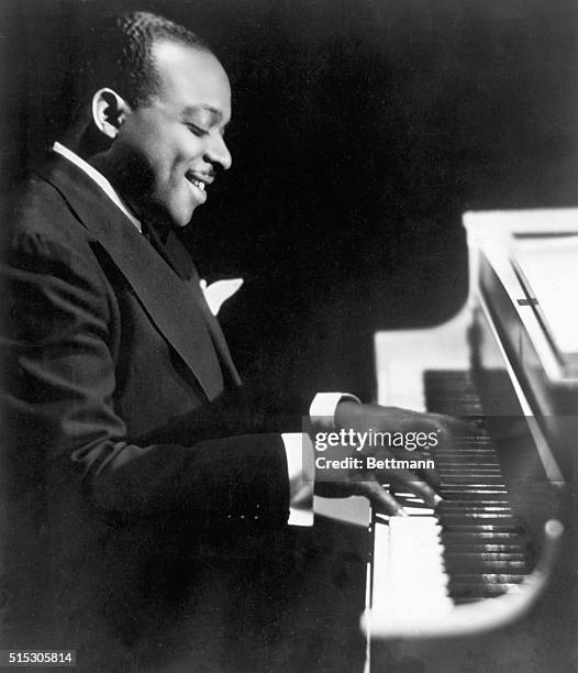 Portrait of Count Basie at the piano. Photograph, September, 1943.