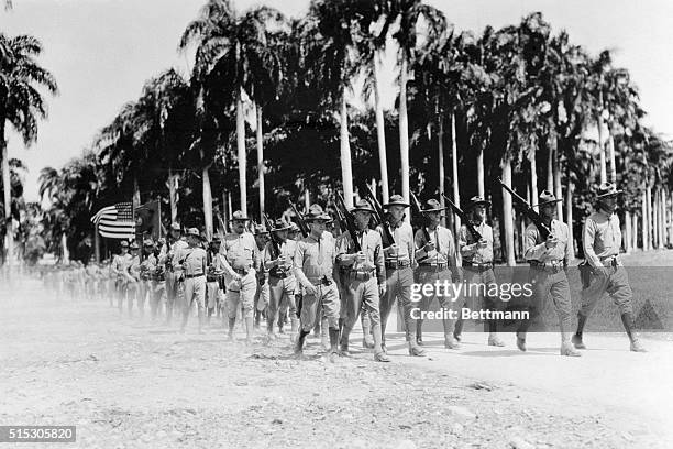 Haiti- U.S. Marines on the march in Haiti, where their early campaigns of 1915 and 1917 are now only a memory, after nineteen years of service in...