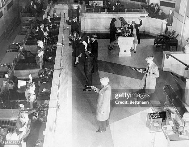 Pittsburgh, PA"Stick 'em up" is the cry of these "bank robbers," as they enter the Monongahela National Bank. The pseudo-bad men were just about to...