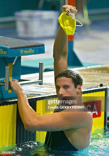 Australian Grant Hackett celebrates after winning the 2002 Manchester Commonwealth Games men's 1500m freestyle finals 04 August 2002. AFP PHOTO GERRY...