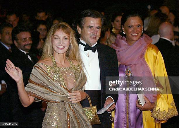 French philosopher Bernard Henri Levy , his wife Arielle Dombasle and Betty Lagardere, wife of French businessman Jean-Luc Lagarderre, arrive at a...
