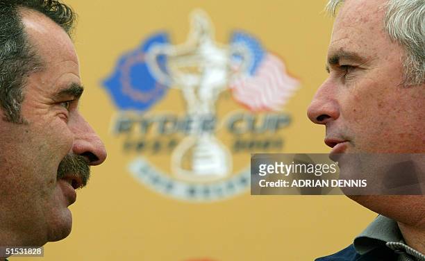 Team captains Sam Torrance of Europe and Curtis Strange of the USA face each other 23 September 2002 during a press conference at the 34th Ryder Cup...