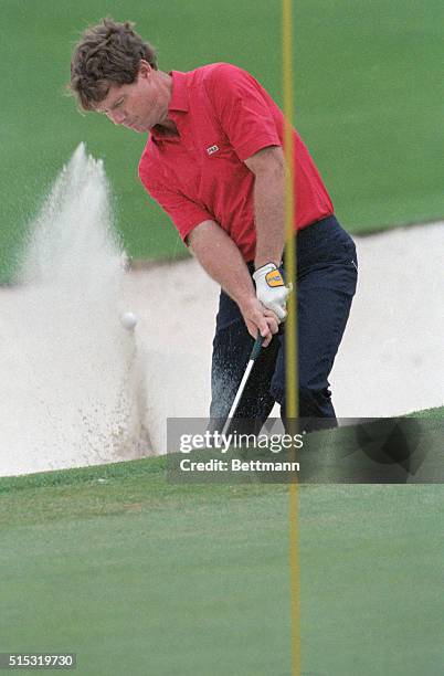 Augusta: Two-time Masters champion Tom Watson blasts out of a trap on the second hole on his way to a bogey during the 3rd round of the Masters 4/13.