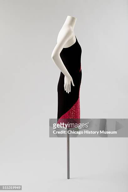 One-shouldered cocktail dress, designed by Karl Lagerfeld for Chloe, with red sequined triangular insets, 1982. Shown as part of the Chicago History...