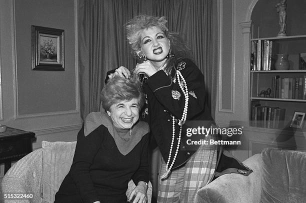 New York: Rocker Cyndi Lauper, she of the outrageous hairdo, shows Dr. Ruth Westheimer how it's done. Cyndi appeared on Good Sex! With Dr. Ruth...