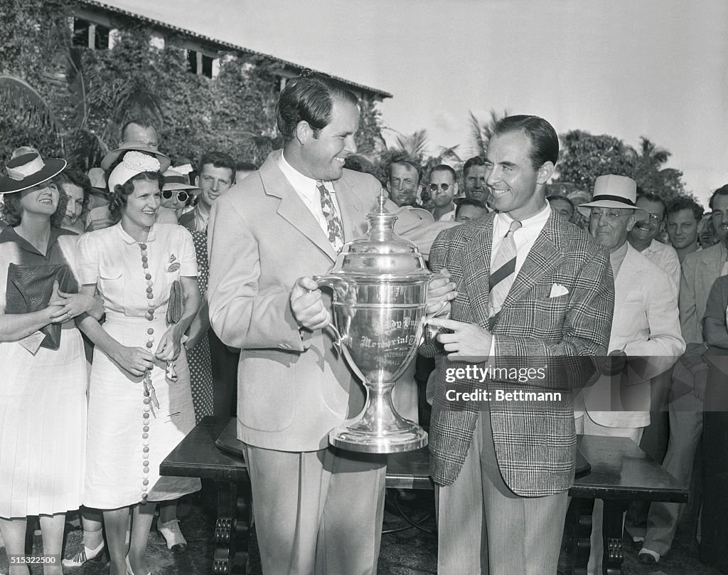 Ralph Guldahl and Sam Snead Sharing Trophy