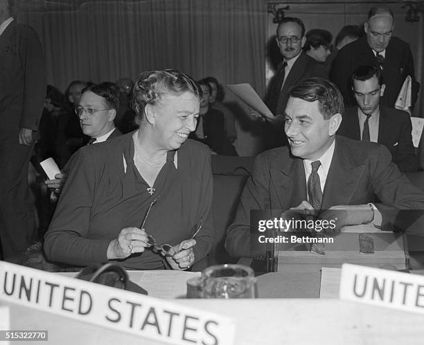 Mrs. Eleanor Roosevelt, , member of the U.S. Delegation to the UN, chats with Mr. E.. Davies, M.P. And member of the British Delegation, during the...