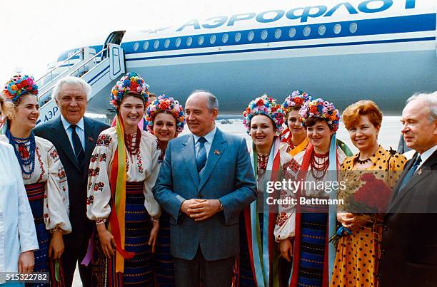 Raisa Gorbachev and Communist Party Leader Mikhail Gorbachev being greeted on arrival in Kiev.