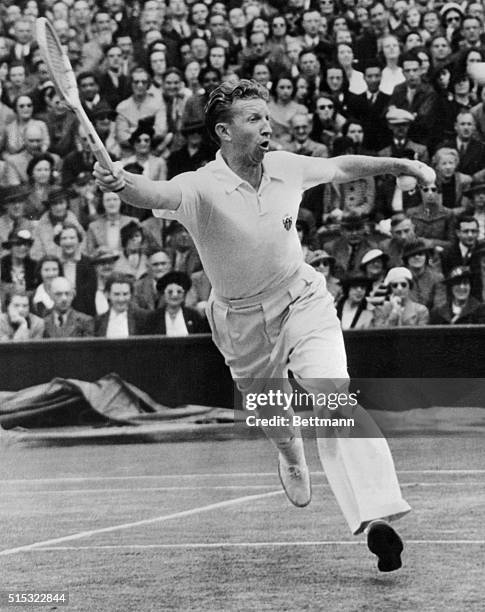 Don Budge in play against Punceo, whom he beat, in the semi-finals at Wimbledon.