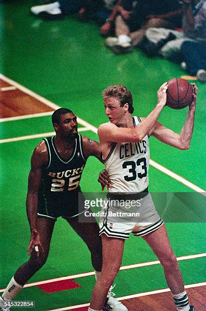 Bucks' Paul Pressey guards Celtics' Larry Bird closely as Bird looks downcourt during the second quarter of the 7th game of the NBA eastern...