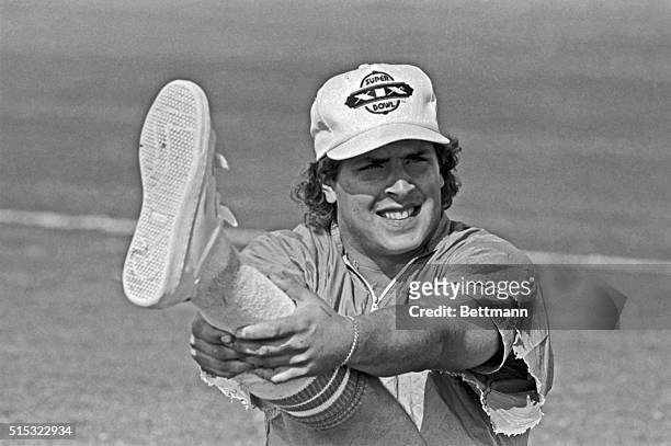 Miami Dolphin quarterback Dan Marino sports a Super Bowl baseball cap as his team, who won the AFC Championship by defeating the Pittsburgh Steelers...