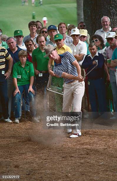 Augusta: First-round leader Gary Hallberg kicks up the pine needles as he hits his approach shot to the 3rd green during 2nd round of the Masters...