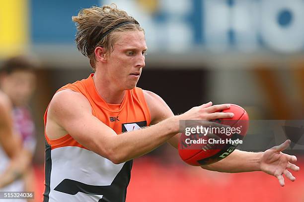 Lachie Whitfield of the Giants kicks during the NAB Challenge AFL match between the Brisbane Lions and the Greater Western Sydney Giants at Metricon...