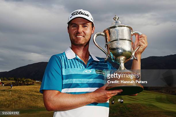 Matthew Griffin of Australia poses with the New Zealand Open trophy after winning the 2016 New Zealand Open at The Hills on March 13, 2016 in...