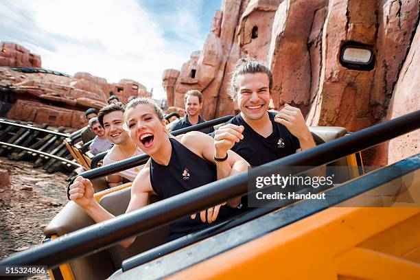 In this handout photo provided by Disney Parks, Front Row, L-R, Kimberly Perry, Reid Perry, Second Row, Neil Perry of The Band Perry take a ride on...