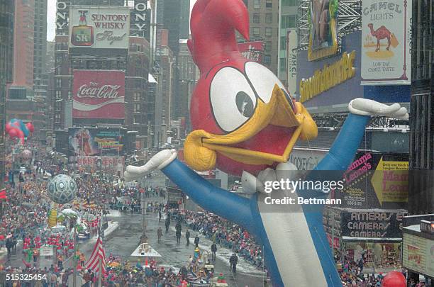 New York: Perennial crowd favorite Woody Woodpecker greets the crowd as he floats past One Times Square during the 63rd Annual Macy's Thanksgiving...