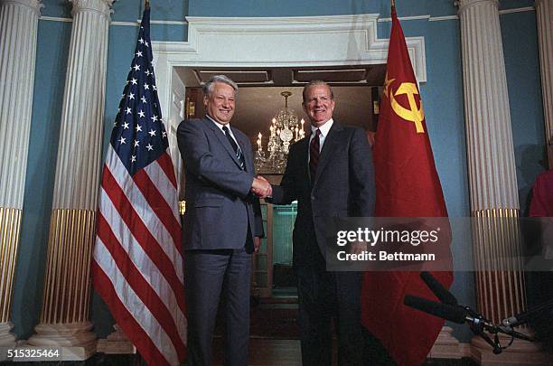 Soviet opposition leader Boris Yeltsin is greeted by Secretary of State James Baker 9/12 at the State department.