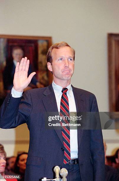 Washington, DC: Neil Bush, son of President George Bush, is sworn in before testifying before the House Banking Committee on his role in the failed...